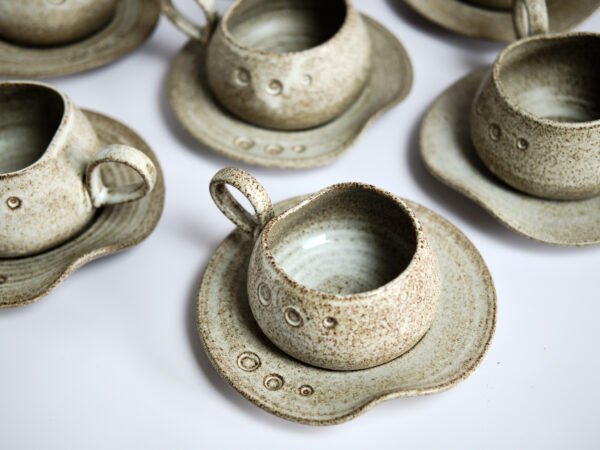 Ceramic mug with saucer