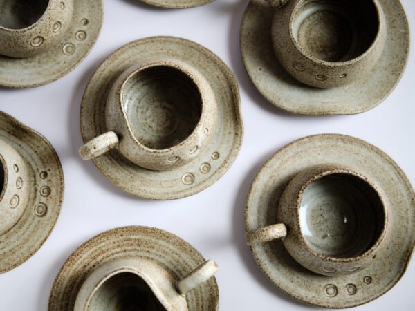 Hand made stoneware mug with saucer